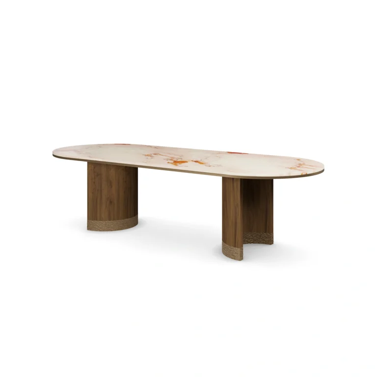 Coralie Dining Table, an elegant dining table by Nolita Harbour in Aegean Rose marble and walnut, with a refined oval form.