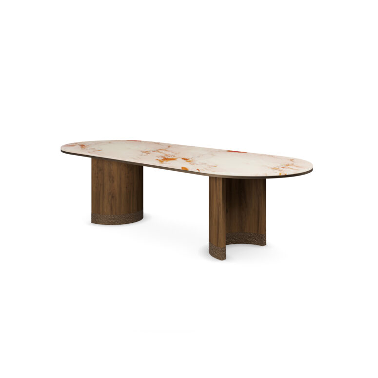 Coralie dining table with an oval Aegean Rose marble top, walnut legs, and hammered aged brass accents at the base of each leg 45 degree view