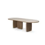 Assia II Dining Table, an elegant dining table by Nolita Harbour in travertine and walnut, with a calm monolithic presence.