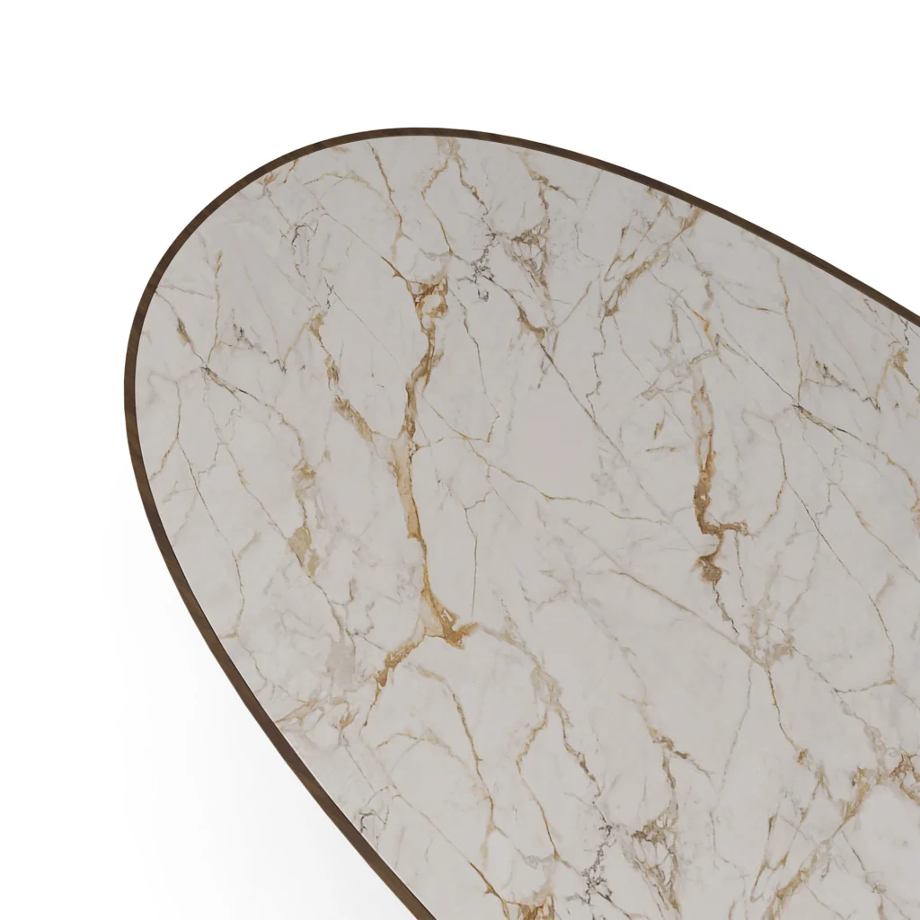 a detailed view of Bari Dining Table, a refined dining table by Nolita Harbour that combines marble top, walnut legs, and brass accents.