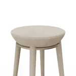 Rondi II bar stool details by Nolita Harbour, bouclé upholstered chair with walnut frame, brass detail, and refined architectural line.