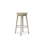 Rondi II bar chair by Nolita Harbour, bouclé upholstered walnut bar chair with brass footrest and sculptural silhouette.