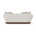 Anki modular sofa by Nolita Harbour in velvet and bouclé, sculptural curved seating with architectural walnut base.