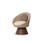 Basqui dining chair by Nolita Harbour, bouclé upholstered chair with walnut pedestal base and sculptural elliptical silhouette.