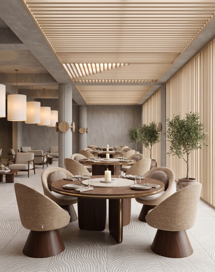 Basqui dining chair by Nolita Harbour, bouclé upholstered chair with walnut pedestal base and sculptural elliptical silhouette in a luxury dining room.