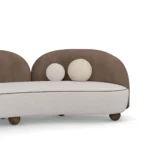 Ellora curved sofa detail by Nolita Harbour, velvet and bouclé upholstered sofa with sculptural form and organic flowing lines.