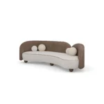 Ellora luxury sofa by Nolita Harbour, asymmetrical curved sofa in velvet and bouclé with sculptural silhouette and refined details.