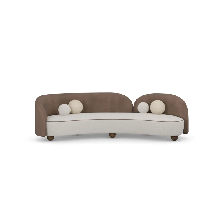 Ellora sofa by Nolita Harbour, sculptural curved sofa in velvet and bouclé with rounded wood feet and asymmetrical design.