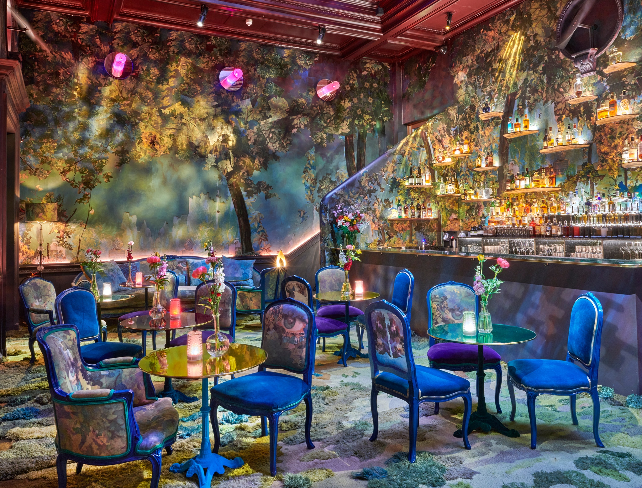 "Scenic outdoor dining area overlooking a serene waterfront, with modern seating and ambient lighting creating a relaxed and inviting atmosphere." - Nolita Harbour 