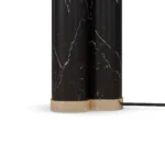 Detailed view of the Arnaud Table Lamp, an elegant table lamp by Nolita Harbour that combines black marble base, metal stem, and fabric shade.