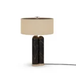 Arnaud Table Lamp, a sculptural table lamp by Nolita Harbour in marble, metal, and fabric, offering a calm ambient glow.
