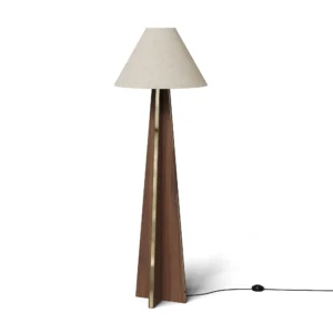 Bapt Floor Lamp, a sculptural floor lamp by Nolita Harbour in wood, brass, and fabric, with a geometric carved base and soft glow.