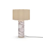 Beatrice Table Lamp, a refined table lamp by Nolita Harbour in marble, metal, and pleated fabric shade, casting warm light.