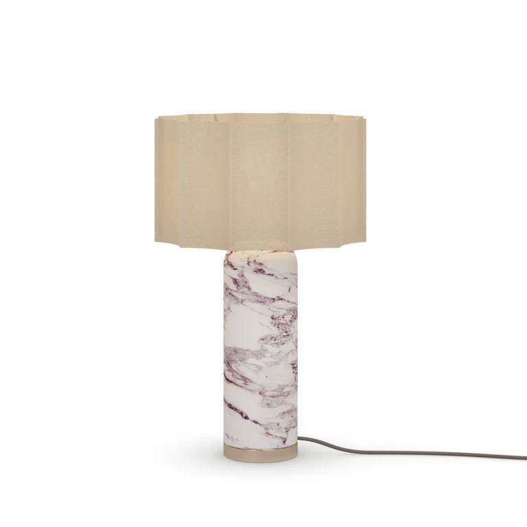 Beatrice Table Lamp, a refined table lamp by Nolita Harbour in marble, metal, and pleated fabric shade, casting warm light.