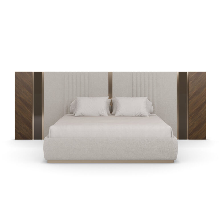 Sampson bed with a grand upholstered headboard, bronze mirror inserts, polished brass accents, walnut panels, and a beige velvet bed frame.