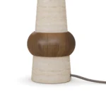 Claus Table Lamp, a refined table lamp by Nolita Harbour that combines travertine, walnut and lacquered dome shade for soft light.