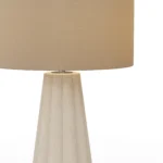 Filp Table Lamp, a modern table lamp by Nolita Harbour in fluted plaster, brass, and fabric shade, with a clean form.
