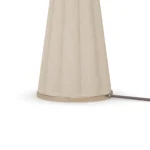 Filp Table Lamp, a refined table lamp by Nolita Harbour combines plaster base, brass detail, and fabric shade for warm light.