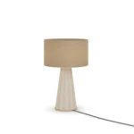 Filp Table Lamp, an elegant table lamp by Nolita Harbour in plaster, brass, and fabric, offering a calm ambient presence.