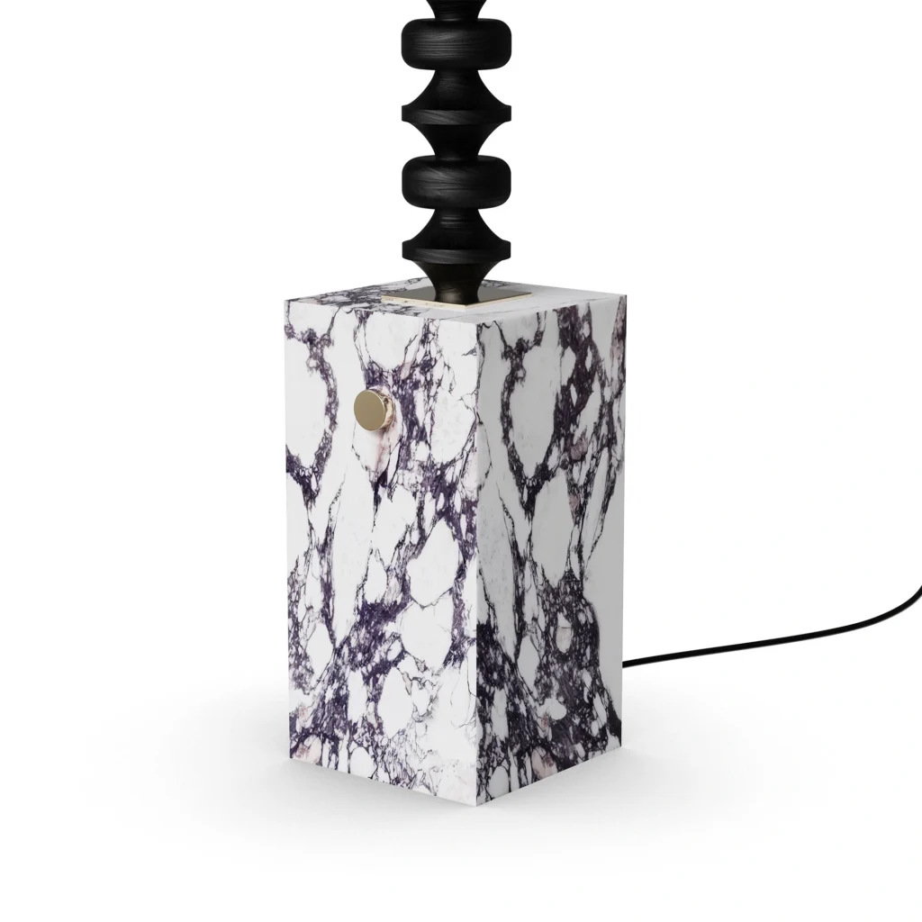 Francis Floor Lamp, an architectural floor lamp by Nolita Harbour in marble, wood, and fabric, creating a warm ambient light.