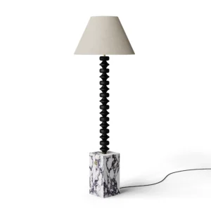 Francis Floor Lamp, a sculptural floor lamp by Nolita Harbour in Viola marble, black wood, and fabric shade, with a calm glow.