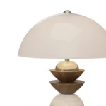 Gustav Table Lamp, a refined table lamp by Nolita Harbour that combines travertine, walnut, and lacquered shade for warm light.
