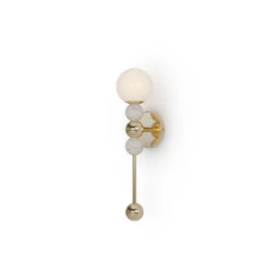 Longi Wall Lamp, a refined wall lamp by Nolita Harbour in Carrara marble, brass, and a glass globe, casting a soft halo glow.