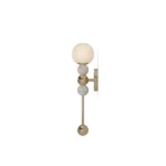 Side view of the Longi Wall Lamp, a sculptural wall lamp by Nolita Harbour in Carrara marble, brass, and glass, with a calm presence.