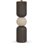 Luuk Table Lamp, an elegant table lamp by Nolita Harbour in stone, black wood, and fabric, offering a calm ambient presence.