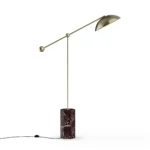 Marc Floor Lamp, a refined floor lamp by Nolita Harbour that combines Porto Rosso marble base and metal structure for balanced light.