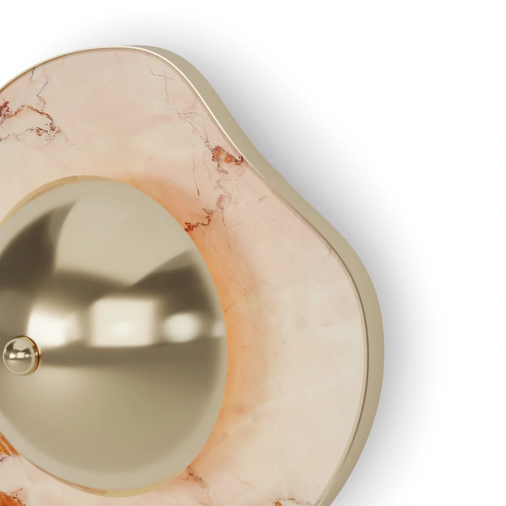 Nenu Wall Lamp, a modern wall lamp by Nolita Harbour in marble and brass, creating a soft halo of light.