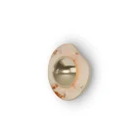 Nenu Wall Lamp, an elegant wall lamp by Nolita Harbour that combines marble backplate and brass arm for warm lighting.