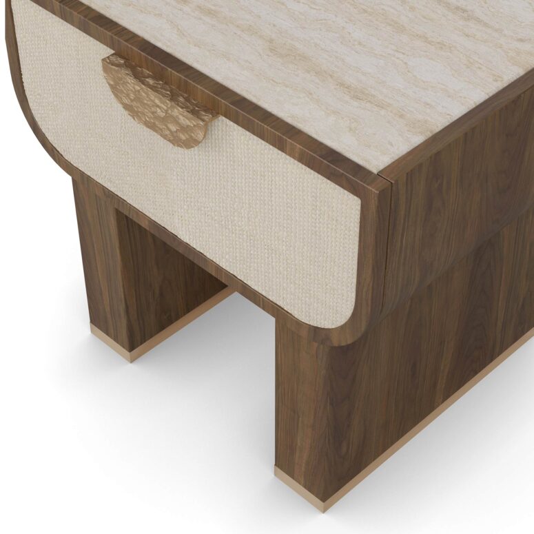 Rae nightstand with a thick drawer, travertine top, walnut frame, and hammered brass handle.