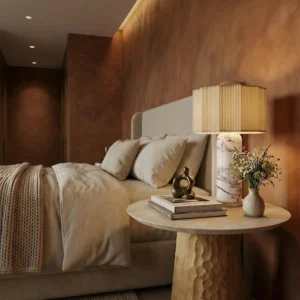 A bedside view of Nolita Harbour furniture, such as the Elke side table, with the luxury Beatrice table lamp to complement it.
