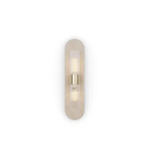 Taj Wall Lamp, an elegant wall lamp by Nolita Harbour in travertine, brass, and fluted glass, casting a soft ambient glow.