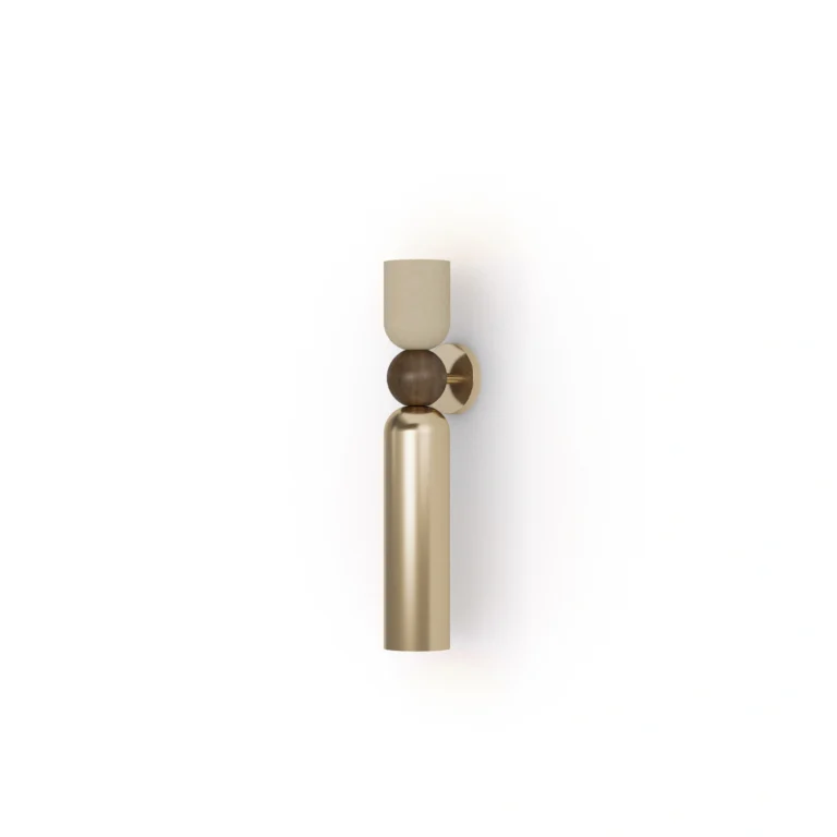 Tubi Wall Lamp, a refined wall lamp by Nolita Harbour in walnut, brass, and plaster shade, casting a warm ambient glow.