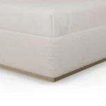 Hudson Bed, detailed view of contemporary bed by Nolita Harbour crafted from walnut wood and premium fabric, defined by a geometric headboard and minimalist form with tactile depth.