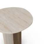 Isa Side Table, a sculptural side table by Nolita Harbour in stone and wood, offering a calm presence.