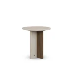 Isa Side Table, a modern side table by Nolita Harbour in travertine and walnut, with a soft round silhouette.