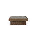 Front view of the Léna coffee table with a carved walnut base and Persian green marble top framed in walnut