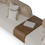 Mela modular sofa by Nolita Harbour in bouclé, curved sectional with woven back detail and sculptural, organic form.