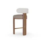Diane Mediterranean bar chair by Nolita Harbour, bouclé upholstered stool with curved back, walnut wood, and brass accents.