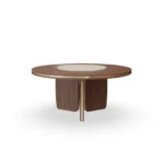 Assia Round Dining Table, a refined dining table by Nolita Harbour that combines stone top and wood base for a calm presence.