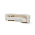 Bénice sofa by Nolita Harbour, curved upholstered sofa in premium fabric with flowing silhouette and sculptural design.