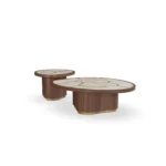 Calienne Coffee Table by Nolita Harbour, a coffee table with a stone top, walnut frame and brass inlay detail.