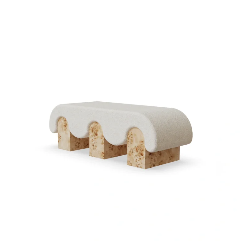 Corinne bench by Nolita Harbour, upholstered bench in textured fabric with rounded edges and cylindrical legs, sculptural design.