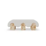 Corinne luxury bench by Nolita Harbour, textured fabric bench with rounded form and statement cylindrical legs.