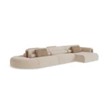 Malora sofa by Nolita Harbour, modular upholstered sofa in fabric with rounded corners and sculptural, continuous seat design.