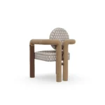Maudine luxury dining chair by Nolita Harbour, upholstered chair with circular back, walnut legs, and refined brass accents.