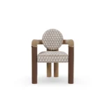 Maudine walnut dining chair by Nolita Harbour, upholstered chair with wrapped arms, patterned fabric, and sculptural silhouette.